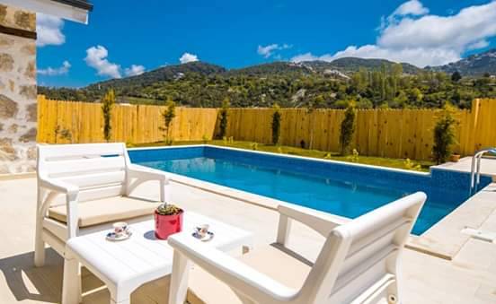 Kalkan Sarıbelen'de Muhteşem Doğada, Korunaklı, Özel Havuzlu, Kiralık Villa
