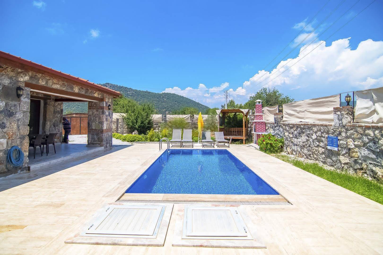 Fethiye Kayaköy'de Otantik Tasarıma Sahip, Özel Havuzlu, Taş Villa